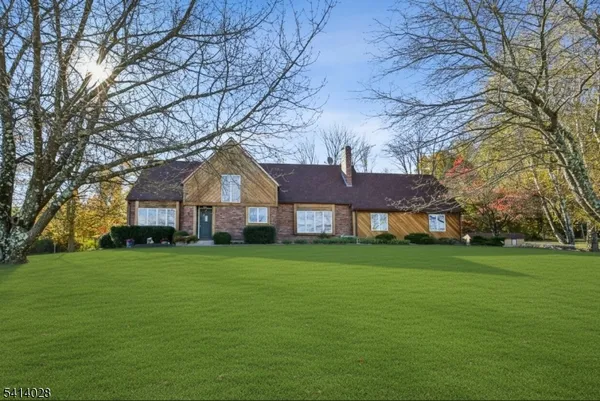 a house view with a garden space