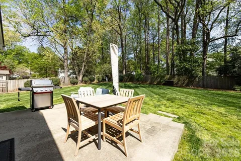 a view of a patio with a yard