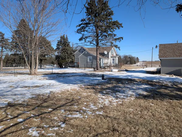 a view of road with large trees