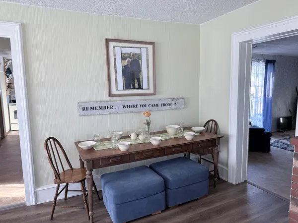 a view of a workspace with furniture