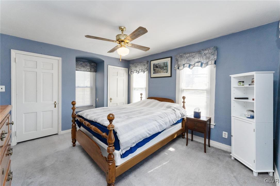 4651 Huckleberry Road Orefield, PA 18069 - Photo 16 of 30 a bed room with a bed and a ceiling fan
