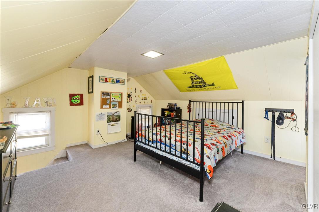 4651 Huckleberry Road Orefield, PA 18069 - Photo 21 of 30 a bedroom with a bed and a window