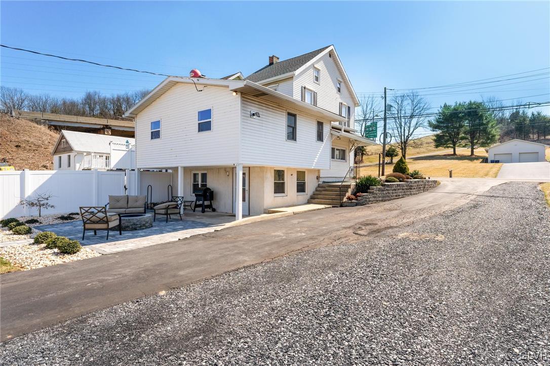 4651 Huckleberry Road Orefield, PA 18069 - Photo 27 of 30 a view of a house with sitting area and view of a house