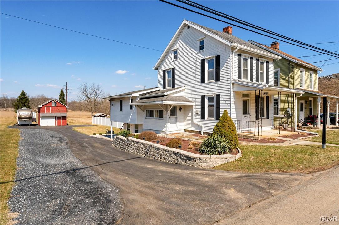 4651 Huckleberry Road Orefield, PA 18069 - Photo 3 of 30 a front view of a house with a yard