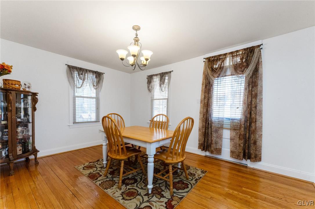 4651 Huckleberry Road Orefield, PA 18069 - Photo 5 of 30 a view of a dining room with furniture and wooden floor