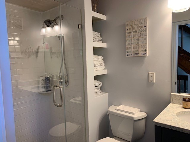 1 Sandy Way Gloucester, MA 01930 - Photo 11 of 14 a bathroom with a shower a toilet and sink