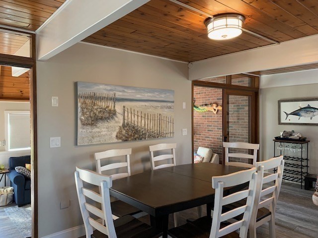 1 Sandy Way Gloucester, MA 01930 - Photo 5 of 14 a view of a dining room with furniture large window and wooden floor