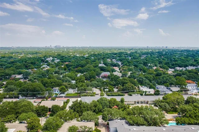 a view of an entryway with wooden floor and a porch