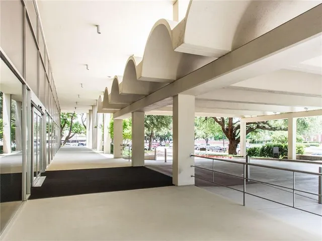 front view of a building with garden