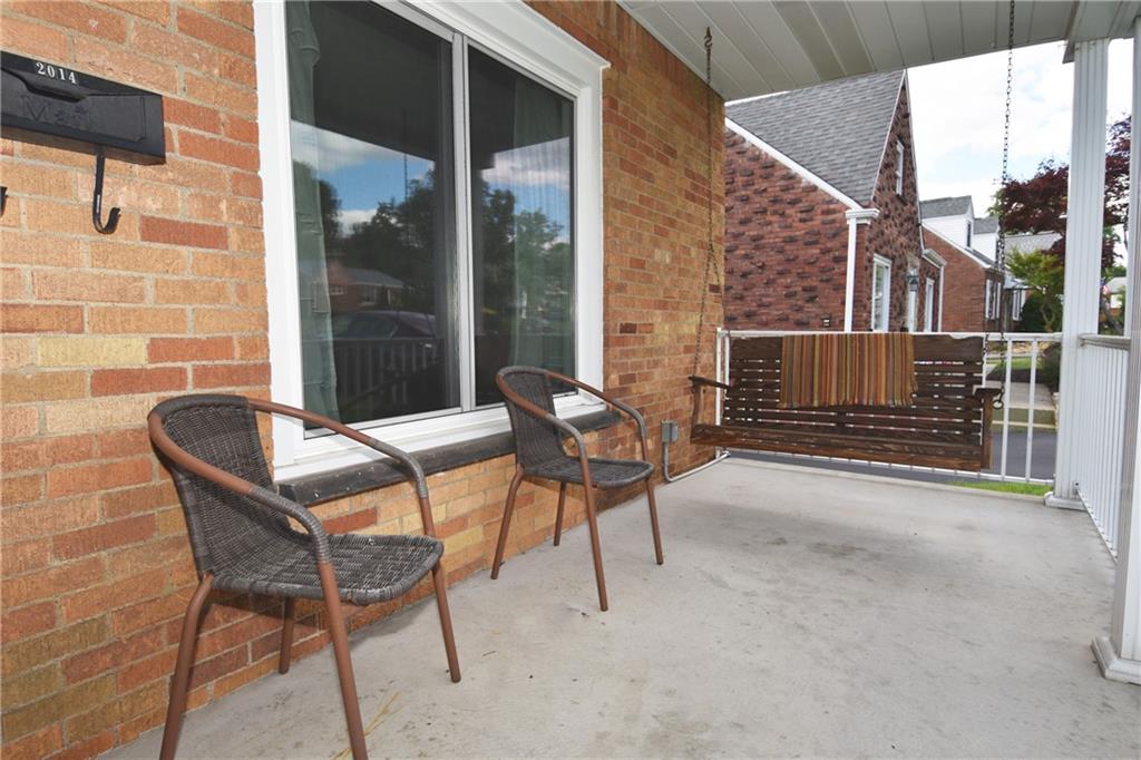 2014 Borland Road Pittsburgh, PA 15243 - Photo 2 of 25 a backyard of a house with table and chairs