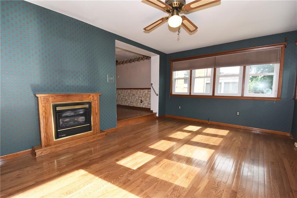2014 Borland Road Pittsburgh, PA 15243 - Photo 11 of 25 a view of an empty room with window and wooden floor