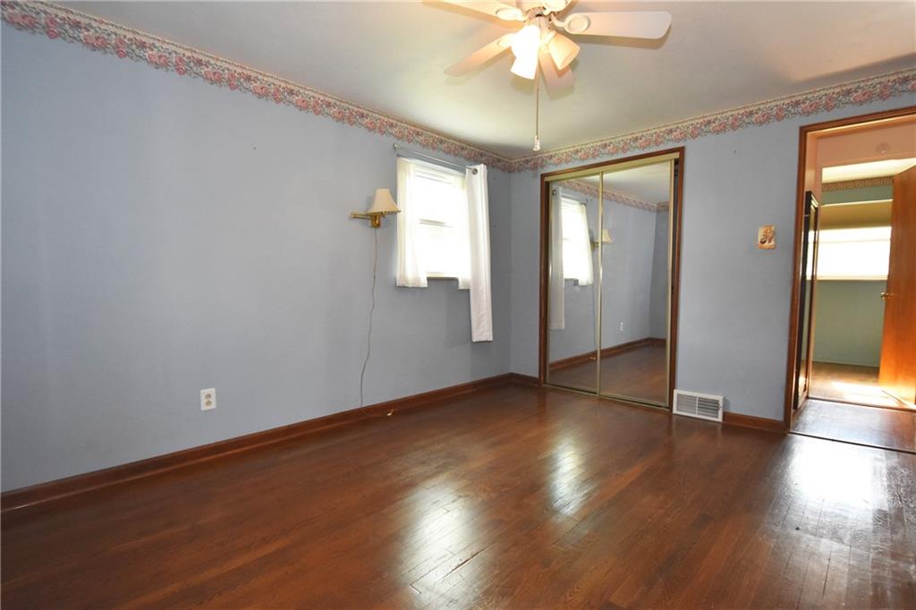 2014 Borland Road Pittsburgh, PA 15243 - Photo 14 of 25 an empty room with wooden floor and windows