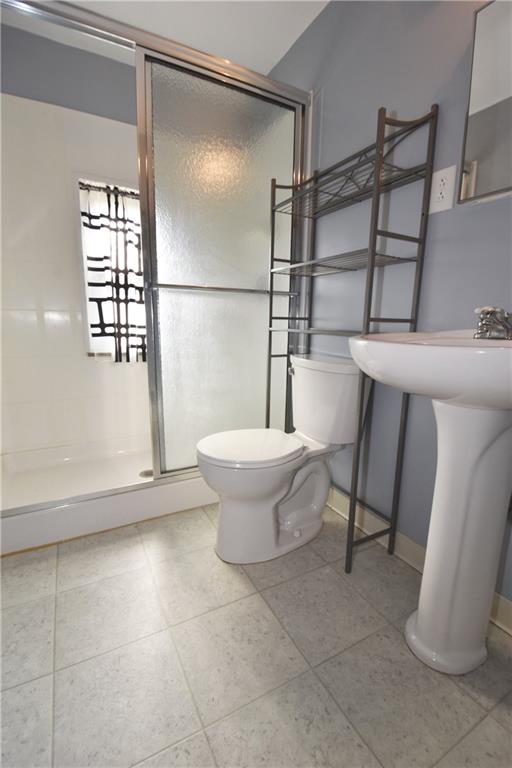 2014 Borland Road Pittsburgh, PA 15243 - Photo 16 of 25 a bathroom with a toilet and a shower
