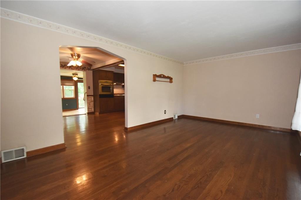2014 Borland Road Pittsburgh, PA 15243 - Photo 3 of 25 a view of a livingroom with wooden floor and kitchen space