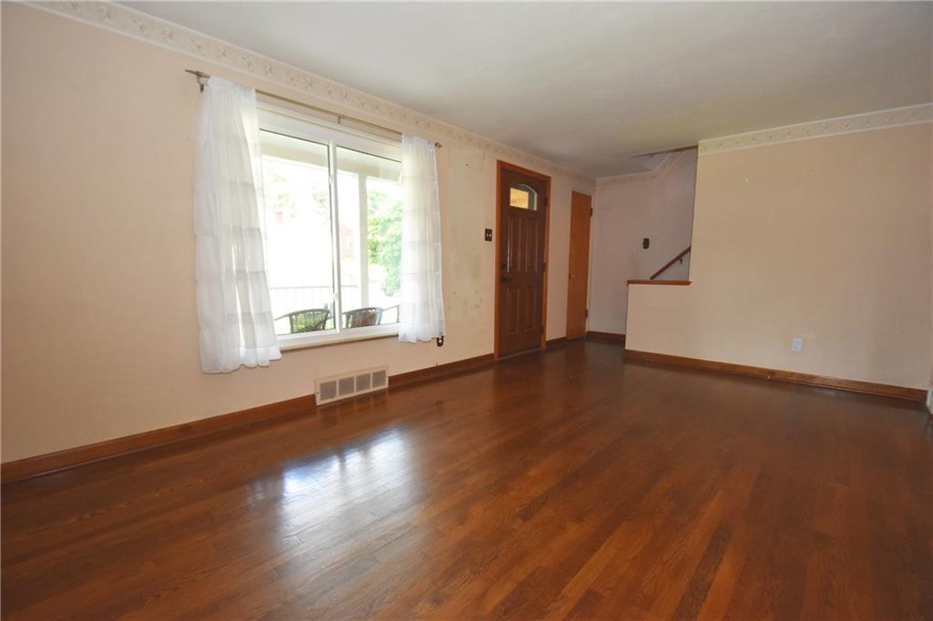 2014 Borland Road Pittsburgh, PA 15243 - Photo 5 of 25 an empty room with wooden floor and windows