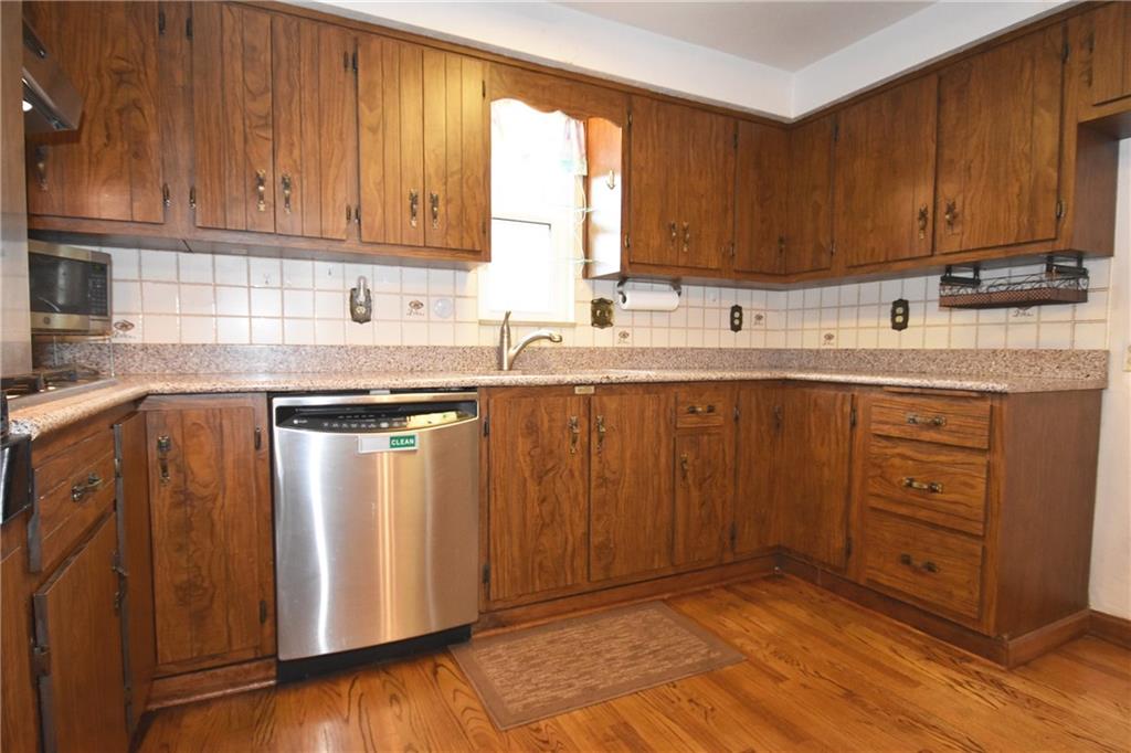 2014 Borland Road Pittsburgh, PA 15243 - Photo 8 of 25 a kitchen with a sink window and cabinets