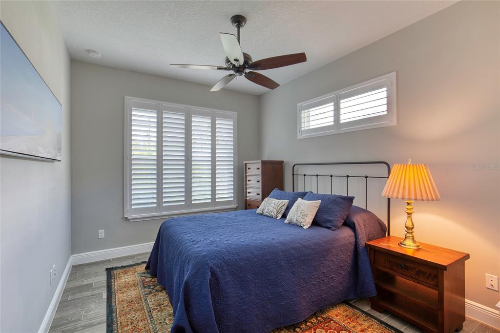 51 Wrendale Loop Ormond Beach, FL 32174 - Photo 28 of 58 a bedroom with a bed and window