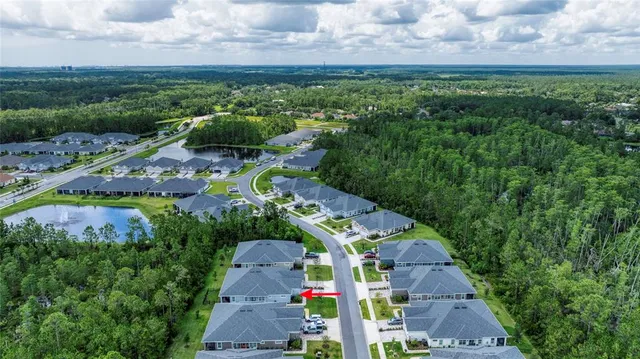 a view of a swimming pool with a yard