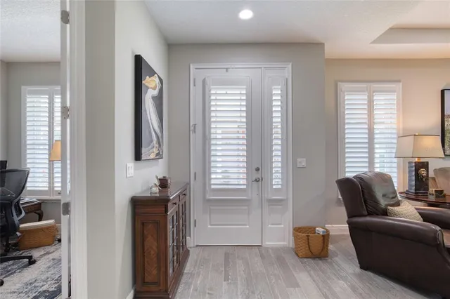 a workspace with furniture and a window