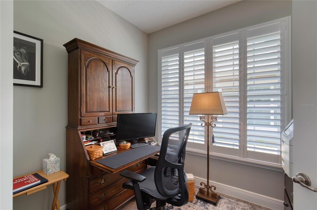 51 Wrendale Loop Ormond Beach, FL 32174 - Photo 8 of 58 a workspace with furniture and a window