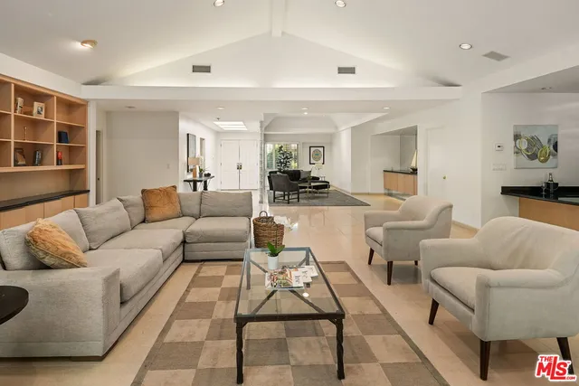 a living room with furniture and a couch