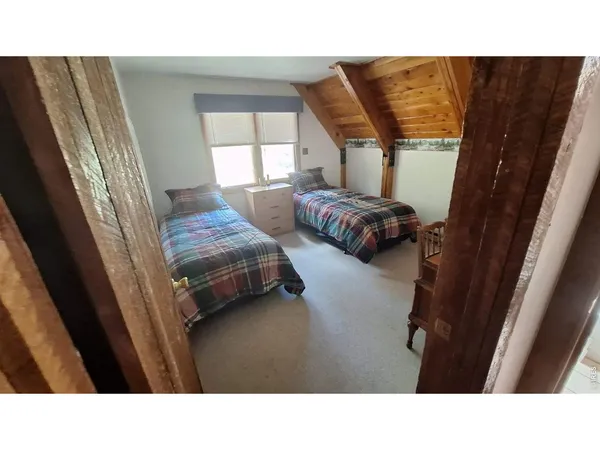a black and white photo of a living room