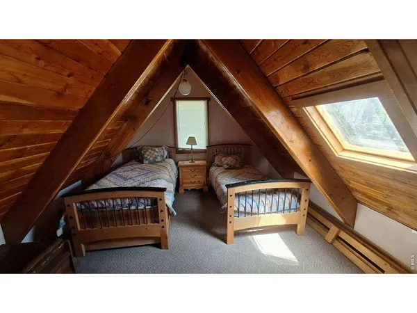 a black and white photo of a living room