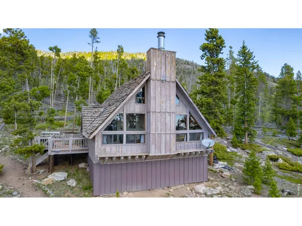 a black and white photo of a house