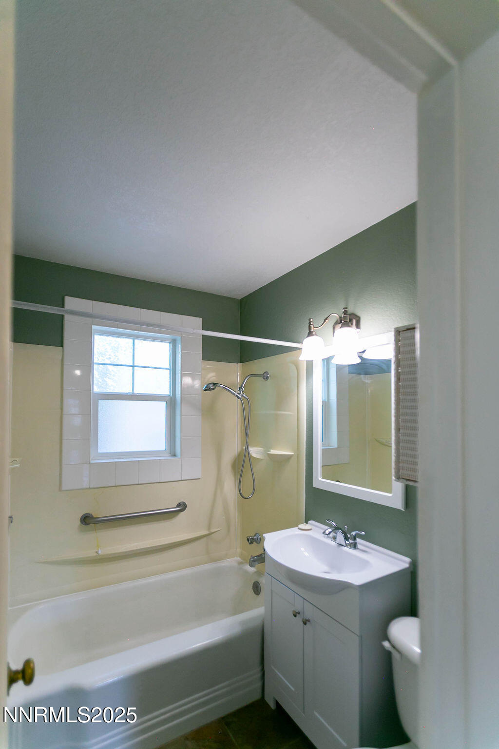 43 Ardmore Drive Reno, NV 89509 - Photo 20 of 28 a bathroom with a granite countertop sink a toilet and shower