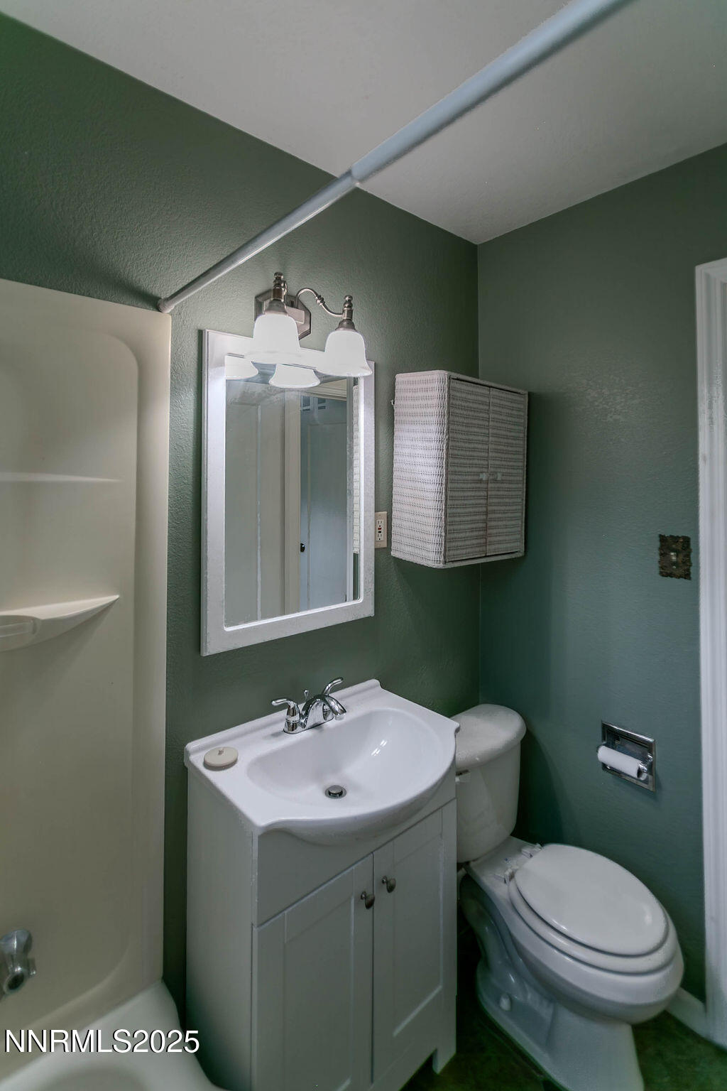 43 Ardmore Drive Reno, NV 89509 - Photo 21 of 28 a bathroom with a sink and mirror with toilet