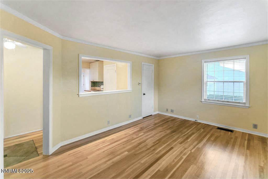 43 Ardmore Drive Reno, NV 89509 - Photo 4 of 28 a view of empty room with wooden floor and fan