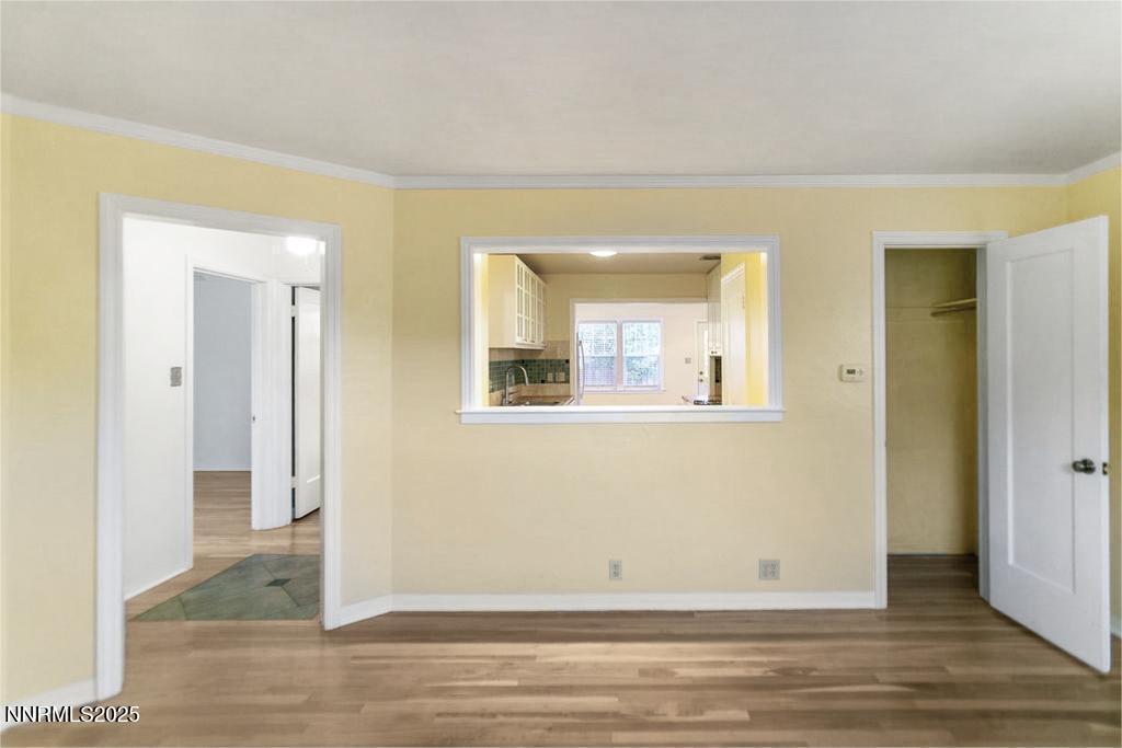 43 Ardmore Drive Reno, NV 89509 - Photo 5 of 28 an empty room with wooden floor and windows