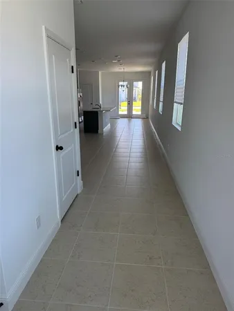 a view of an empty room and window