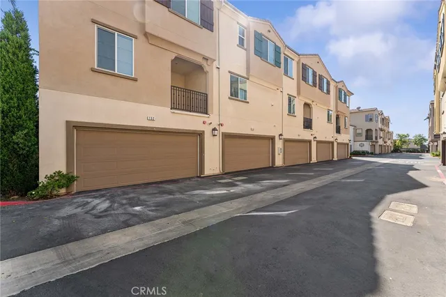 a view of a street with a building