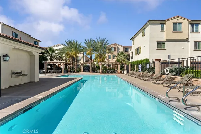 a view of a house with swimming pool