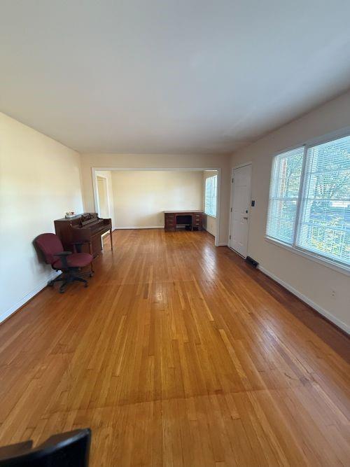 3674 Canton Road Marietta, GA 30066 - Photo 18 of 20 a view of a room with wooden floor and a window