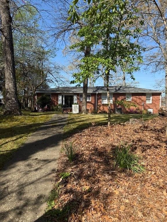3674 Canton Road Marietta, GA 30066 - Photo 6 of 20 a view of a house with a yard