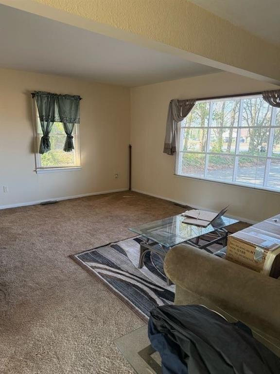 3674 Canton Road Marietta, GA 30066 - Photo 8 of 20 a bed sitting in a room next to a window