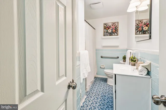 a bedroom with a bed and lamp with window