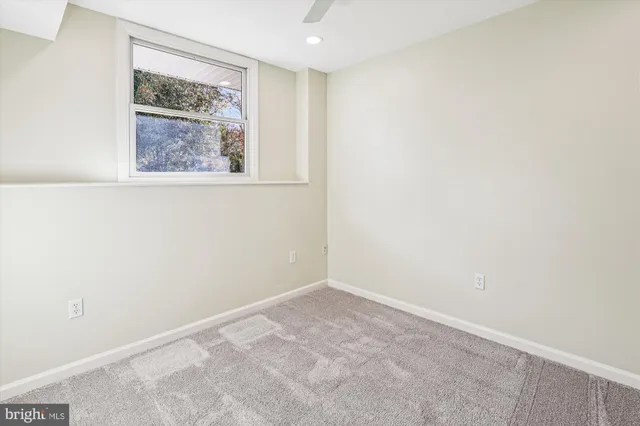 a backyard of a house with seating space