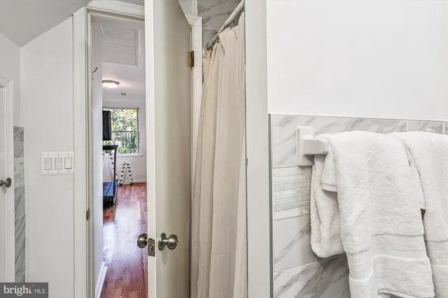 a house with swimming pool in front of it