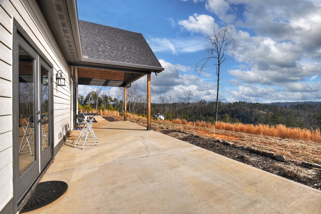 28 Mountaintown Road Ellijay, GA 30540 - Photo 53 of 54 a view of a swimming pool with a patio and yard