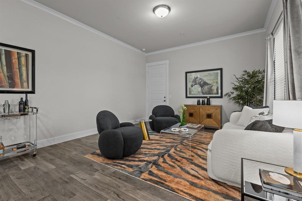 3279 Ganzer Road West, Unit 125B Denton, TX 76207 - Photo 2 of 25 a living room with furniture