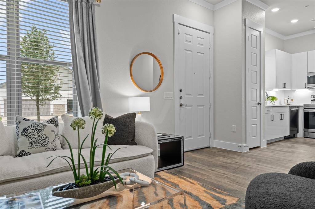 3279 Ganzer Road West, Unit 125B Denton, TX 76207 - Photo 6 of 25 a living room with furniture