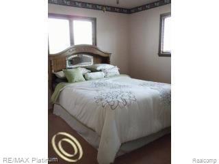 1460 North Gregory Road Fowlerville, MI 48836 - Photo 19 of 24 Master Bedroom.jpg