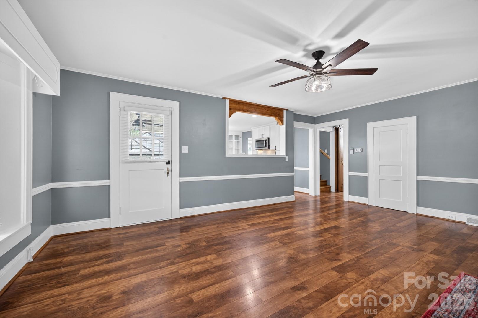 1016 Raney Street Salisbury, NC 28146 - Photo 8 of 45 a view of empty room with wooden floor and fan