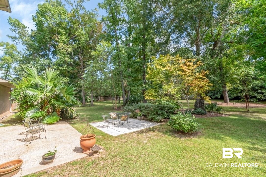 305 Fern Hill Court Mobile, AL 36608 - Photo 52 of 53 View of yard featuring a patio area