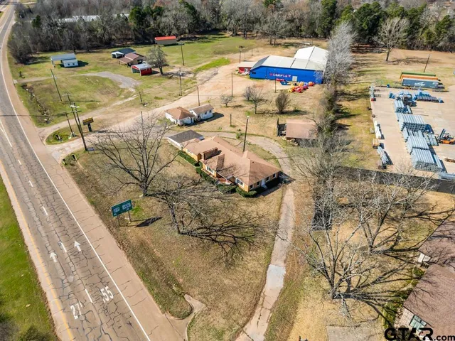 a view of a swimming pool with a lake view and mountain view