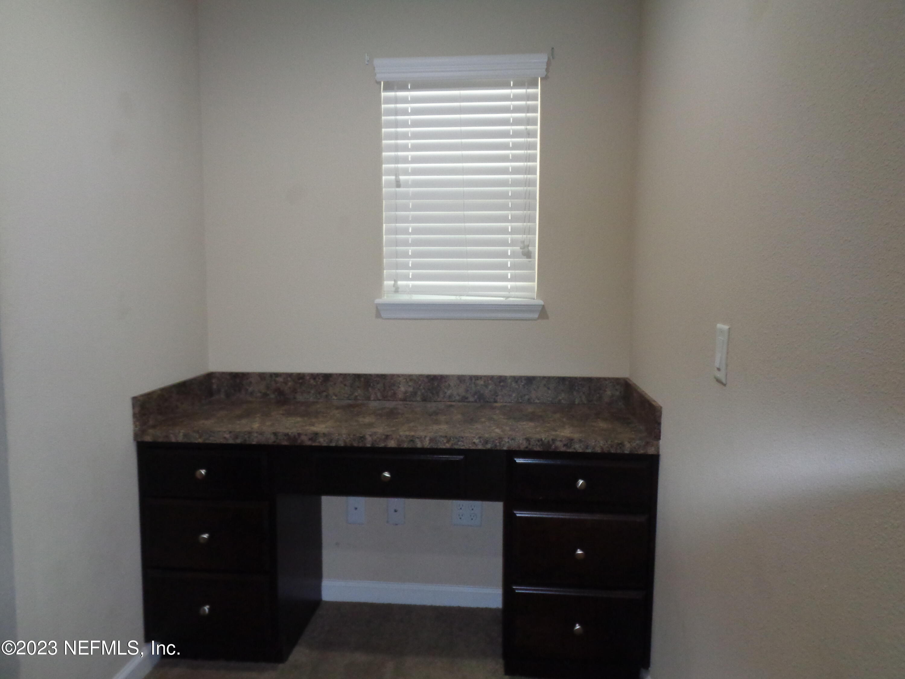 3786 Chasing Falls Road Orange Park, FL 32065 - Photo 11 of 26 a room with a sink and cabinets