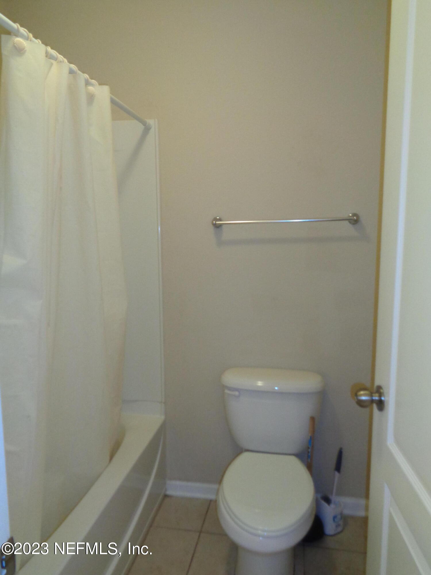 3786 Chasing Falls Road Orange Park, FL 32065 - Photo 12 of 26 a white toilet sitting next to a shower